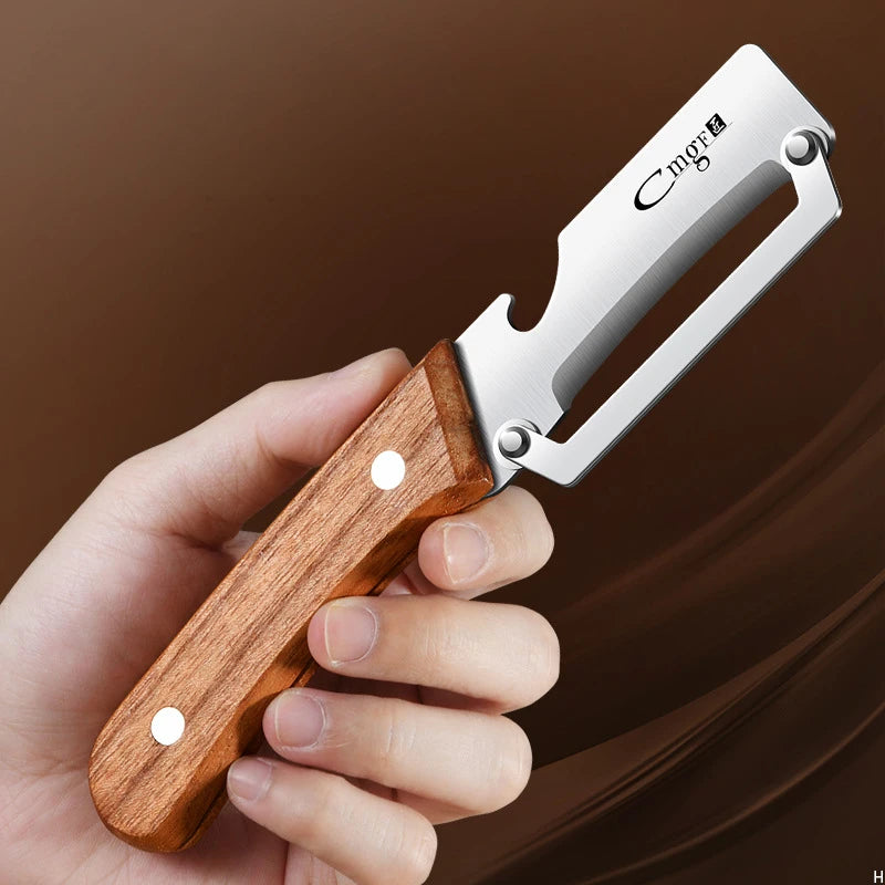 Stainless steel peeler with wooden handle for peeling and slicing - kitchen